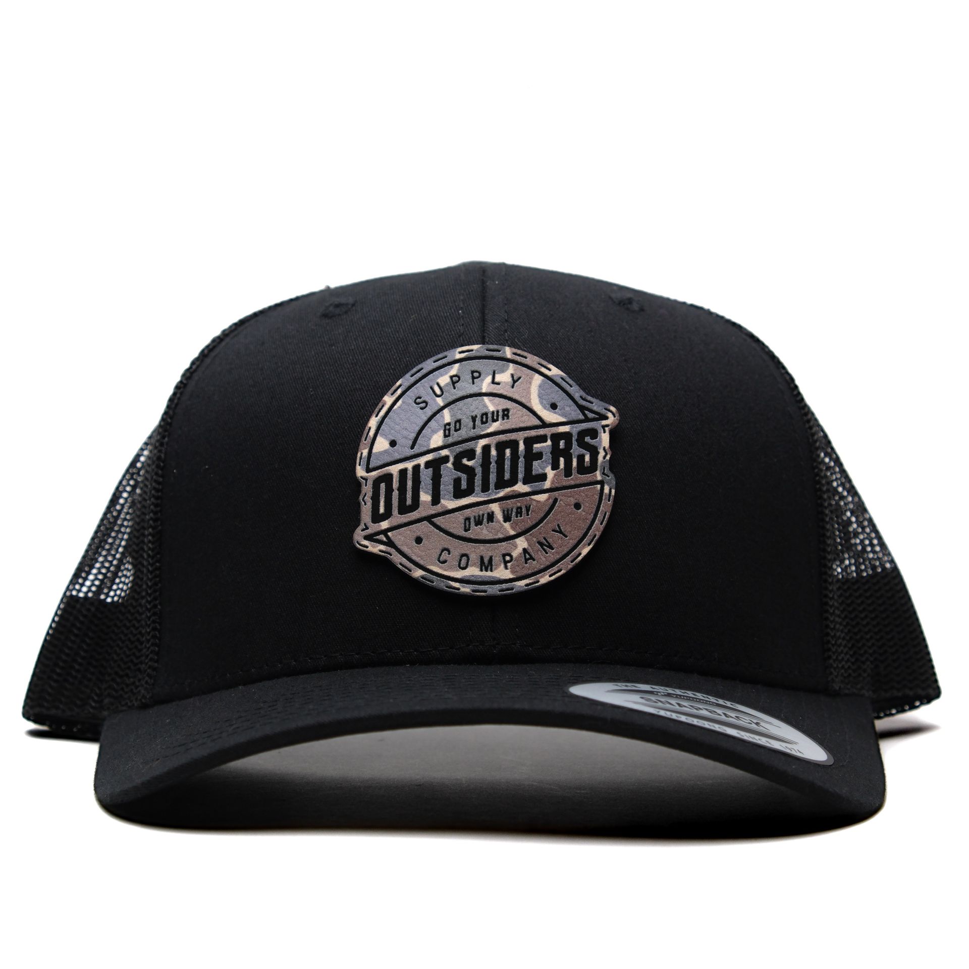 A black hat that says outsiders on it