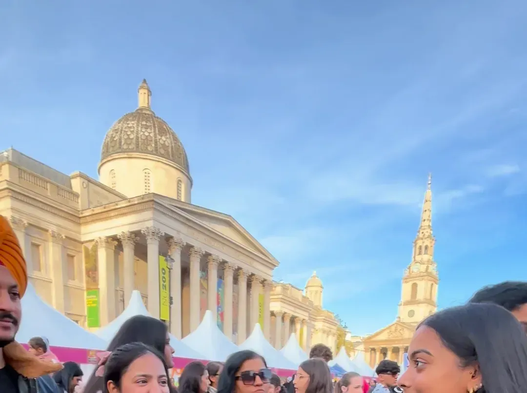 The National Gallery and St Martin-in-the-Fields above the crowd