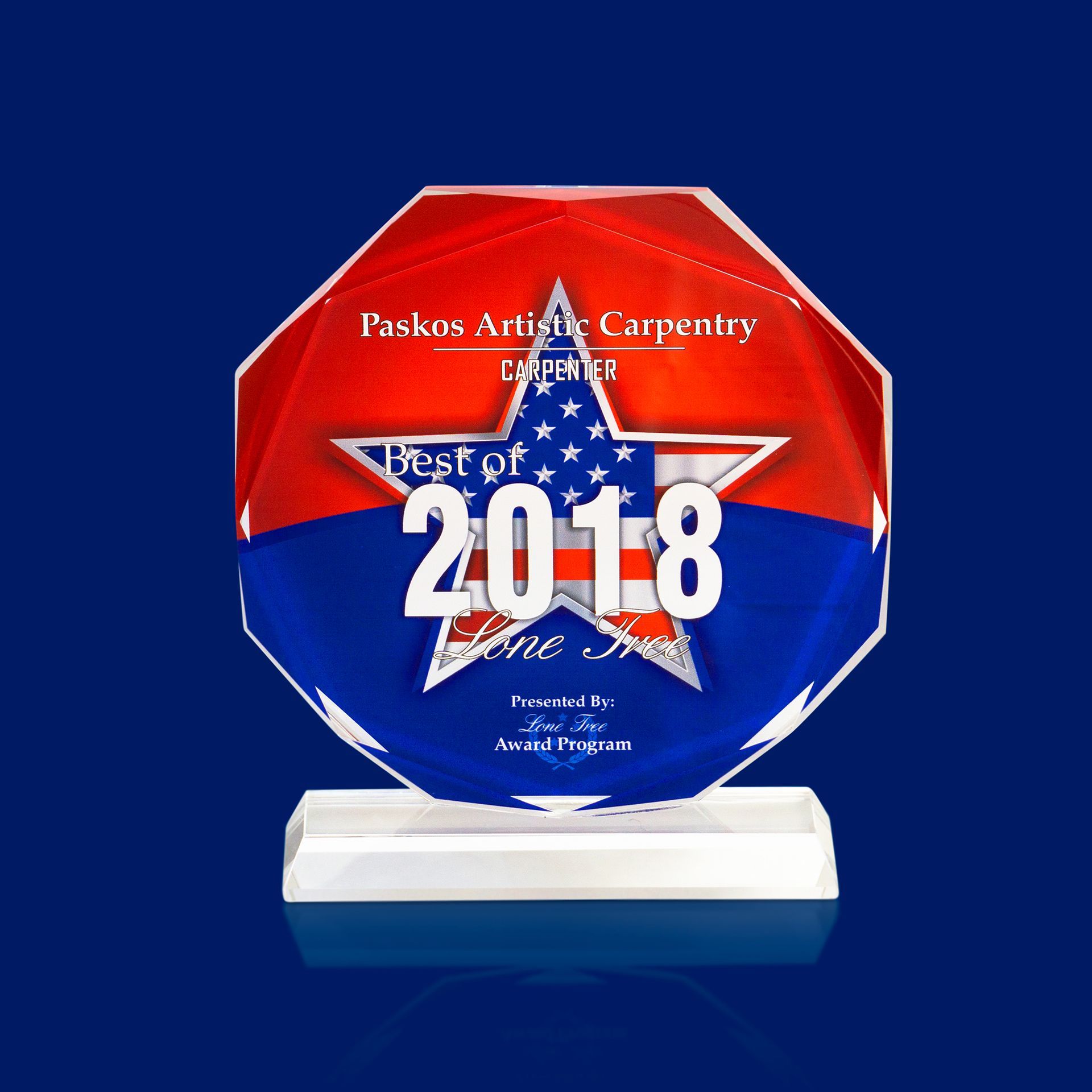 Blue award plaque with red and white star design reading “Best of 2018” on a white base