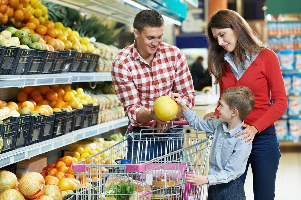 A Family is Shopping for Fruits and Vegetables in a Grocery Store — Howard Springs Supermarket In Howard Springs, NT
