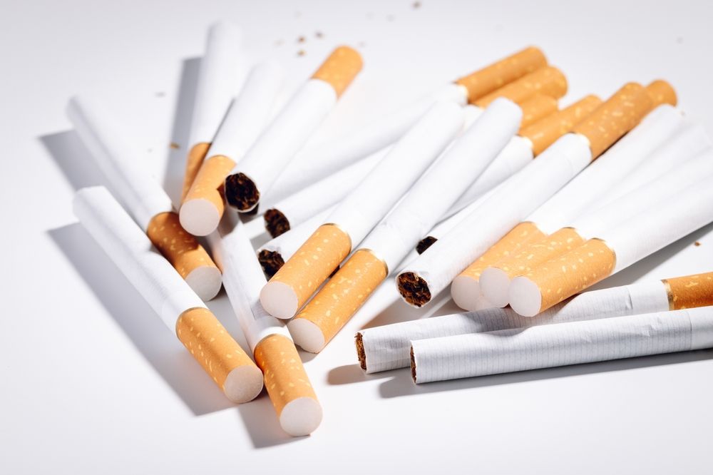 A Pile of Cigarettes on a White Surface — Howard Springs Supermarket In Howard Springs, NT