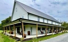 POLE barn in southern md showing metal roofing