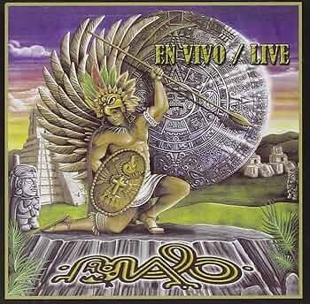 Album cover art: A muscular warrior in feathered headdress kneels with spear and shield. Mayan-inspired architecture is in the background.