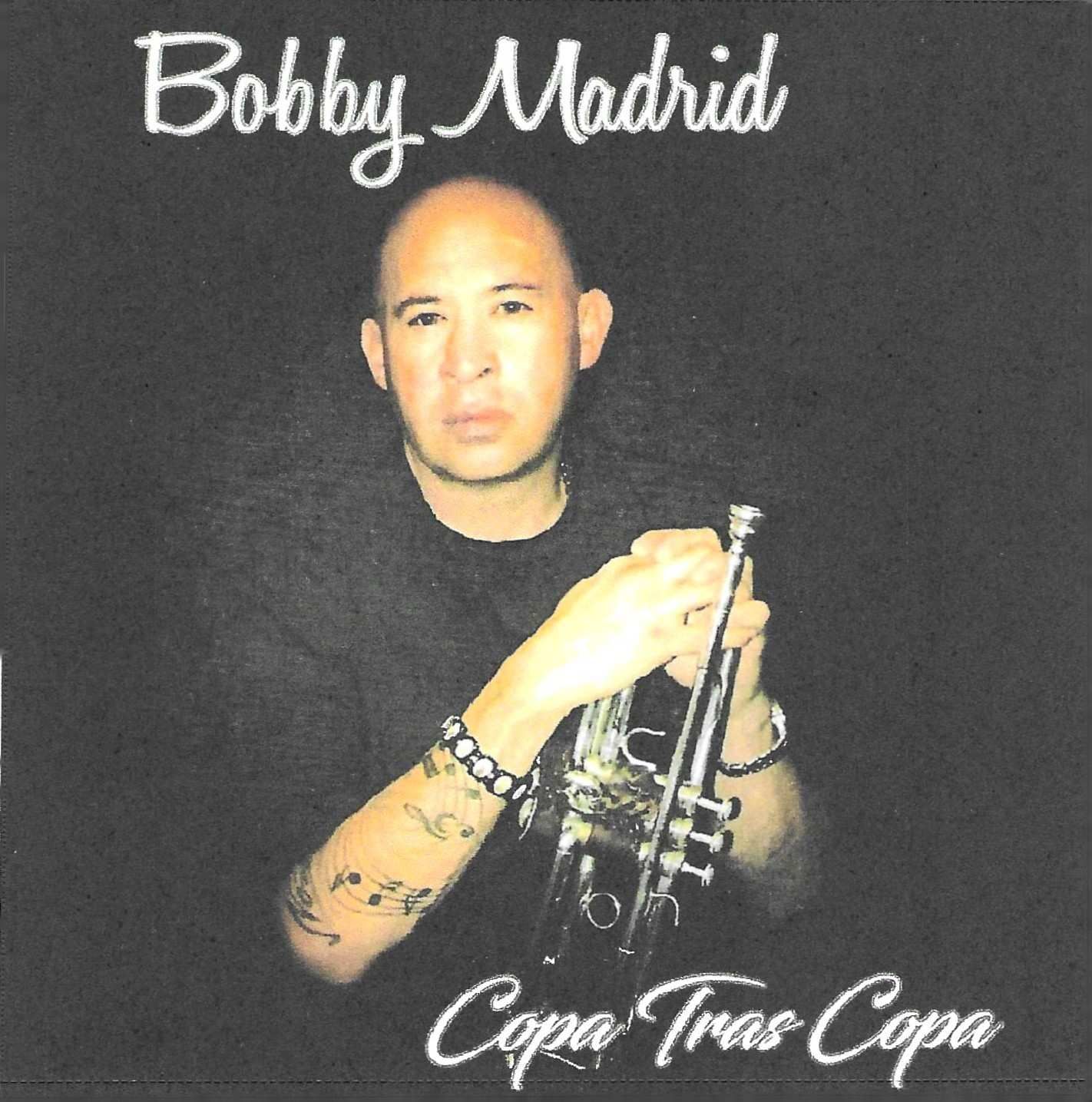 Bobby Madrid album cover featuring a bald man holding a trumpet, with the text