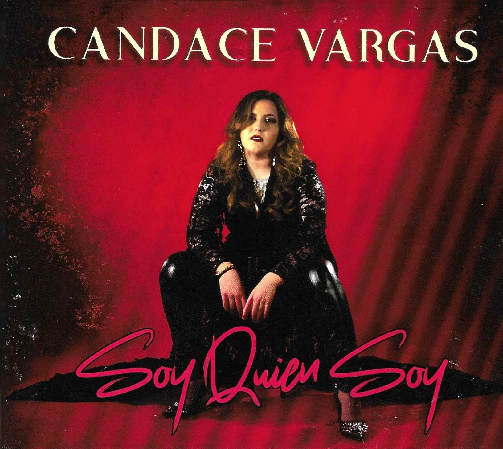 Candace Vargas album cover. She squats in a black sequined outfit against a red backdrop. Text reads