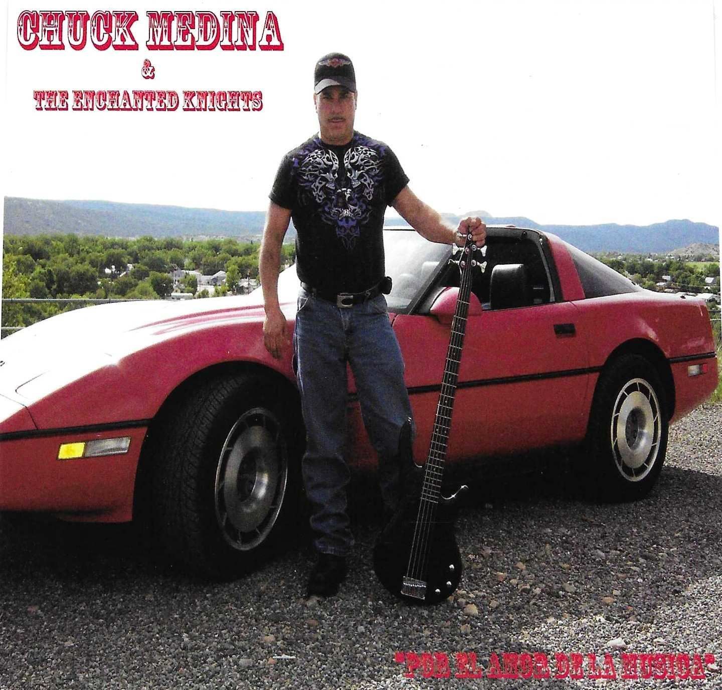 Chuck Medina and the Enchanted Knights album cover. A man with a bass guitar poses next to a red Corvette in a scenic outdoor setting.