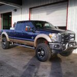 blue jeep near shutter | Steve's Tire & Auto Repair