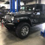 black jeep near pole  | Steve's Tire & Auto Repair