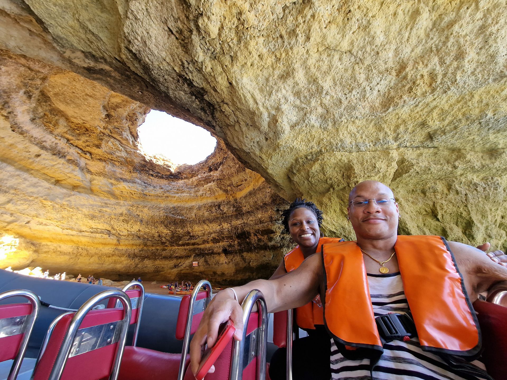 Couple inside Benagil cave during a tour from Lisbon with Duca