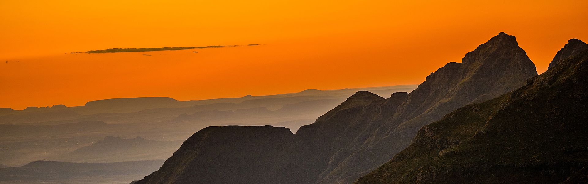Experience the dramatic mountain landscapes of Lesotho at sunset. Discover curated journeys by Belafrique, trusted local partner of Africa DMCs.