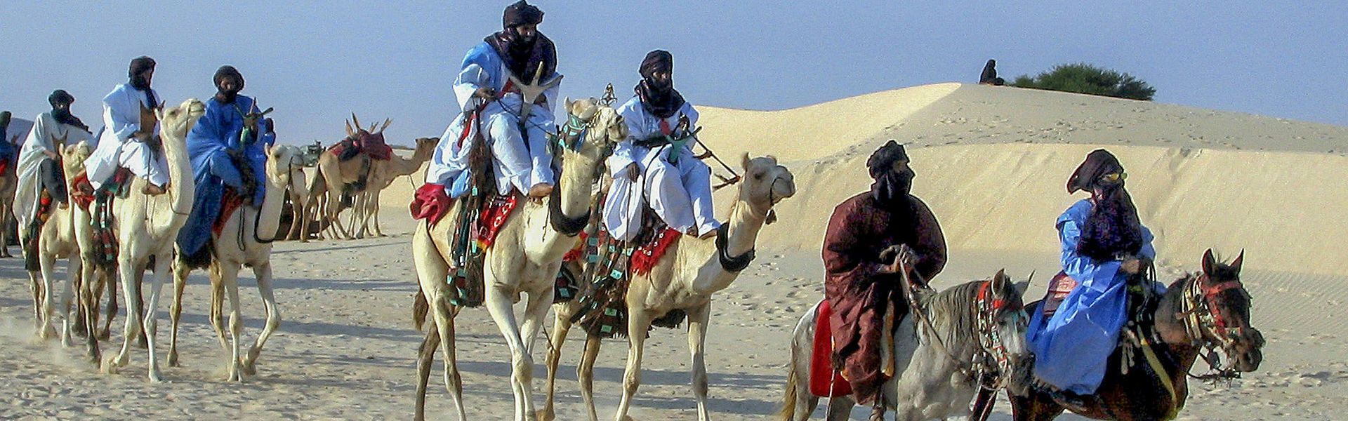 This striking image captures a traditional camel caravan crossing the golden dunes of northern Mali, where Tuareg culture and centuries-old trans-Saharan trade routes continue to shape the spirit of the desert. These timeless journeys offer a glimpse into one of Africa's most captivating landscapes, where vast horizons, rich traditions, and warm hospitality await. Discover the magic of Mali with Masanké Travel, your trusted local DMC for authentic, tailor-made adventures. Through Africa DMC’s network of experienced local tour operators, travelers can explore Mali’s remarkable heritage and extraordinary desert landscapes with confidence.