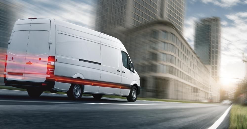 Courier van delivering same day shipments