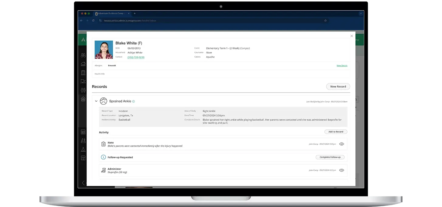 Laptop and phone showing a job application portal with resume and profile details on screen