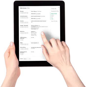 A person is holding a tablet with their finger on the screen