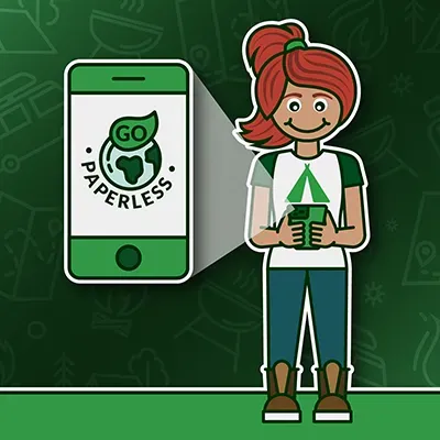 A girl is standing next to a phone that says paperless on it.