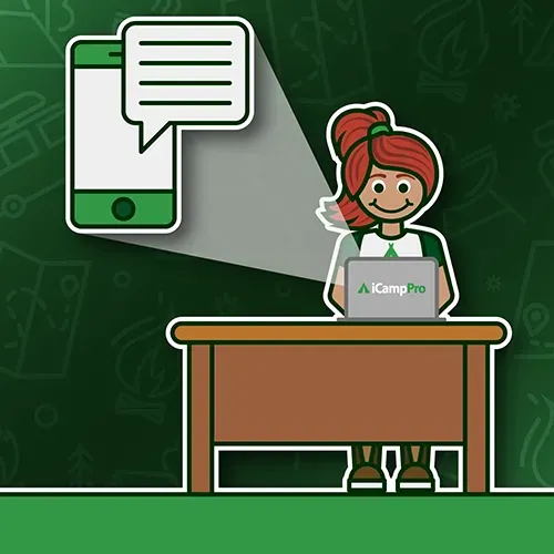A cartoon of a woman sitting at a desk with a laptop and a phone behind her