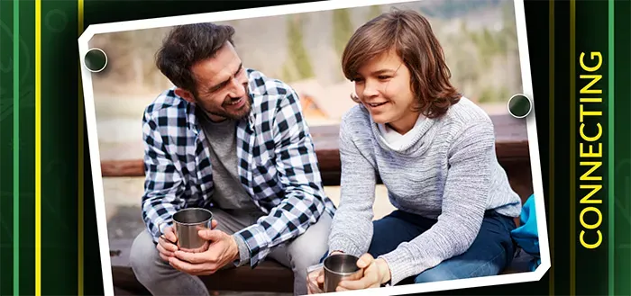 Benefits of campers staying connected to camp - two people in conversation.