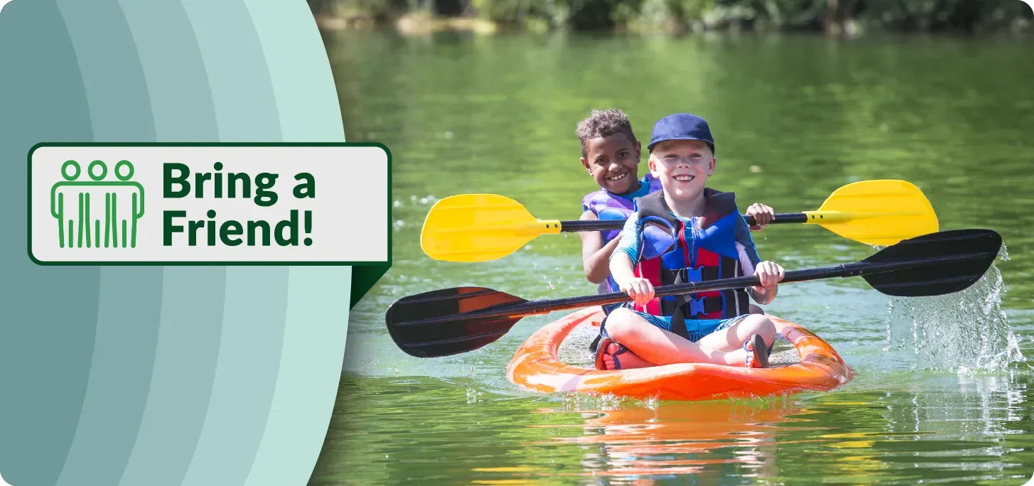 Image of two camp friends on a kayak in the water. Text 