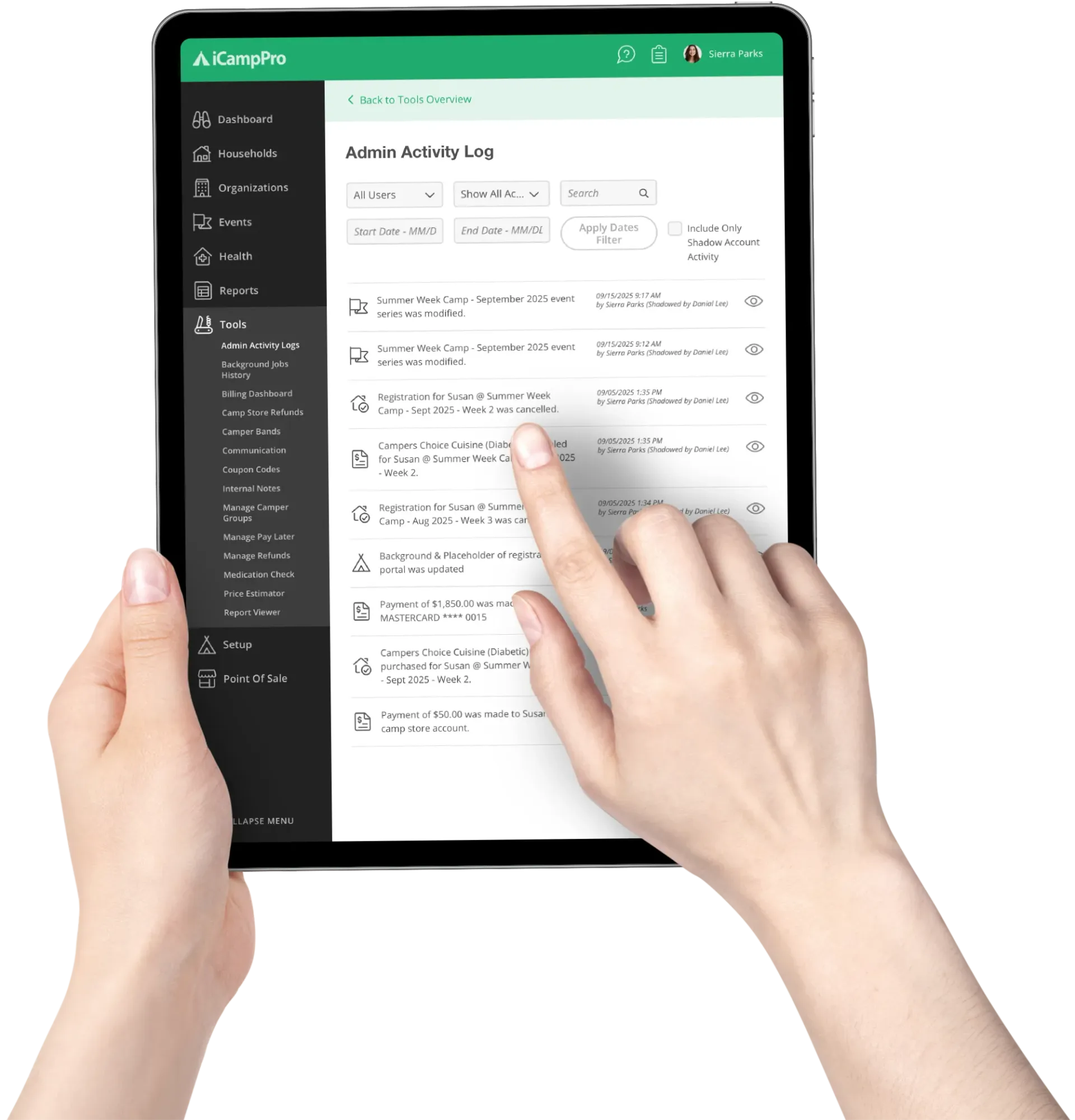 Person using a tablet; screen shows a list of files, hand touches the screen.