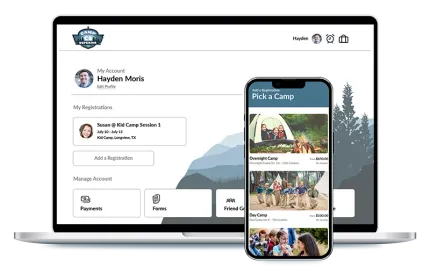 Laptop and phone showing a travel website with scenic camping and outdoor adventure images