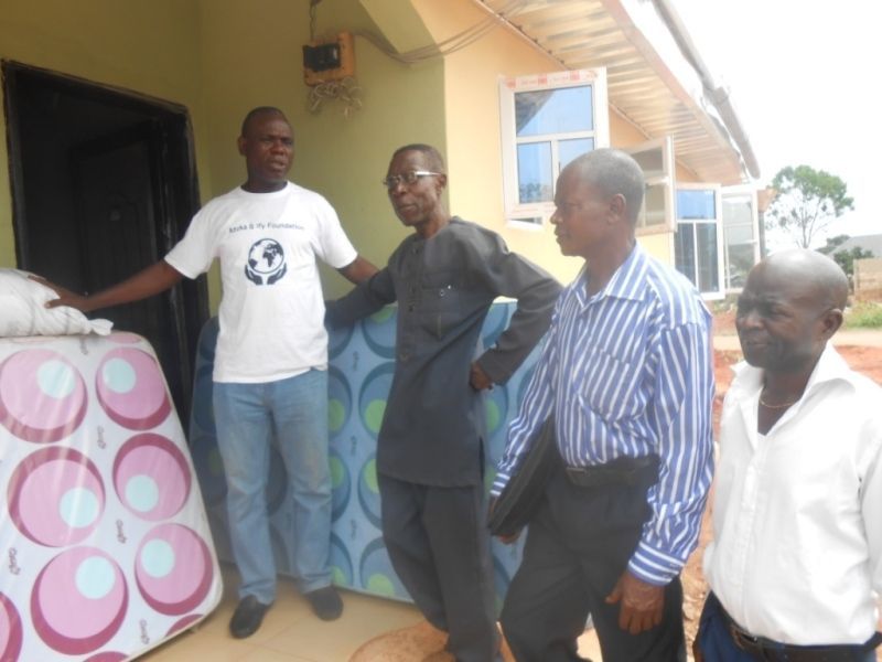 A man in a white shirt with the word recycling on it