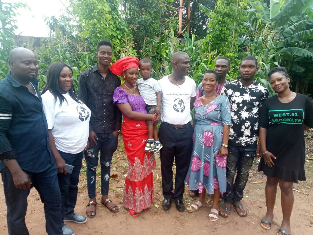 A group of people are posing for a picture together.