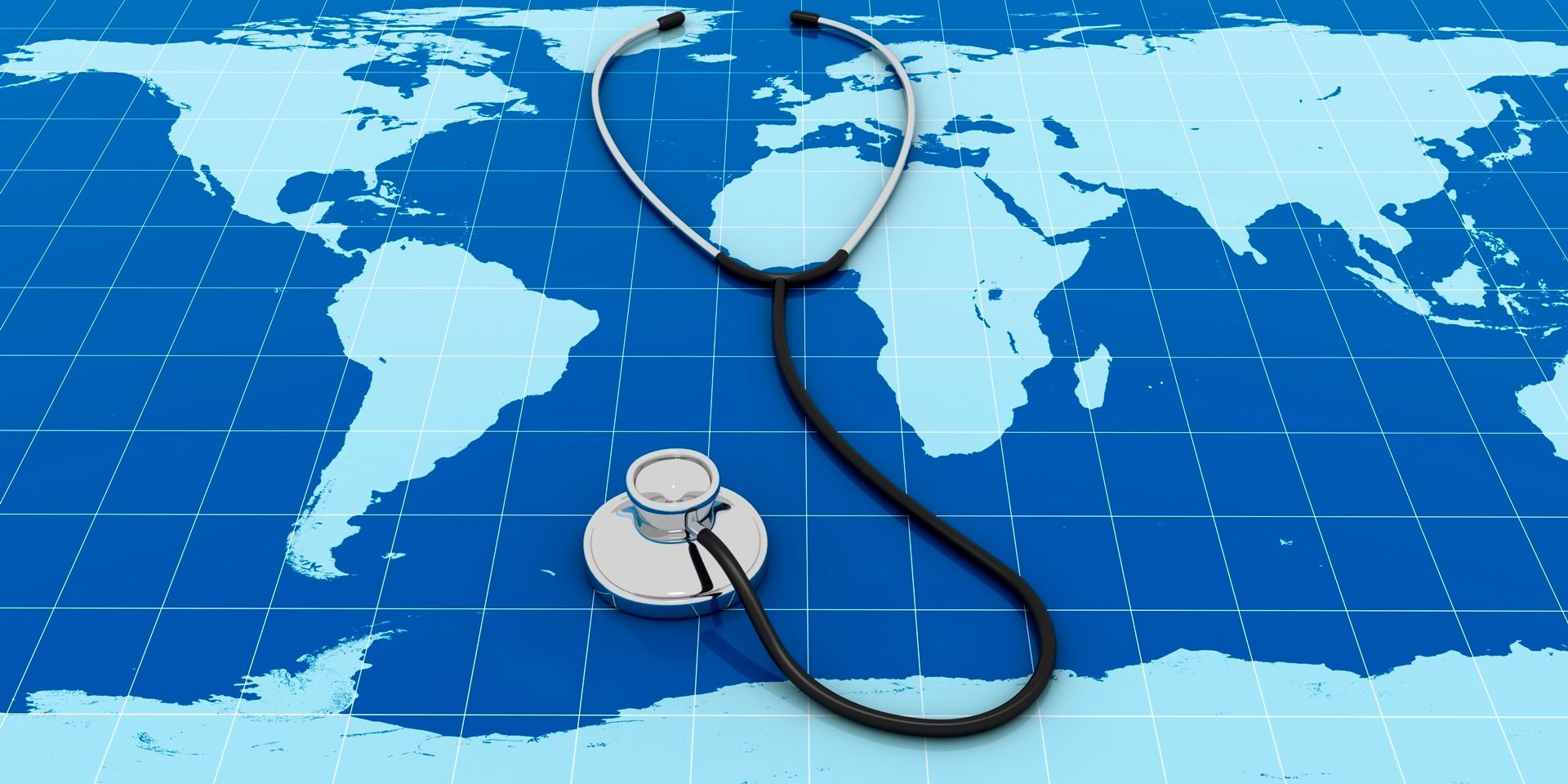 A stethoscope is laying on a map of the world