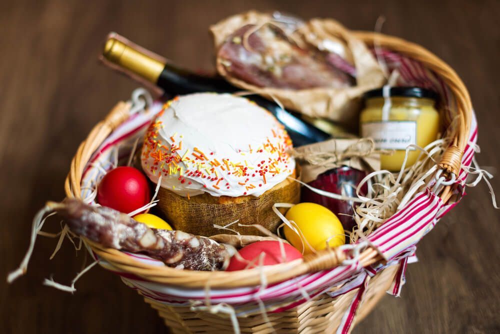Colourful Easter Eggs in a Basket With Cake and Wine — Castletown Flower Hut in Pimlico, QLD