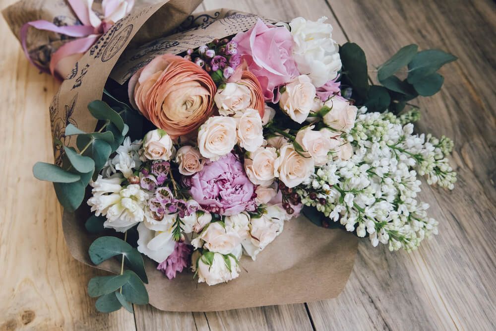 Beautiful Flower Bouquet on the Wooden Table — Castletown Flower Hut in Pimlico, QLD