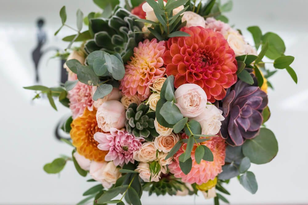 bright wedding bouquet of summer dahlias and roses — Castletown Flower Hut in Pimlico, QLD