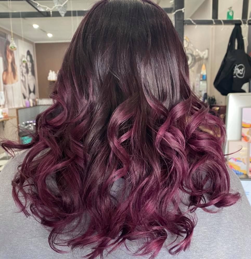 A Woman with Purple Hair Is Standing in A Salon — Ammo Hair and Beauty In Maclean, NSW