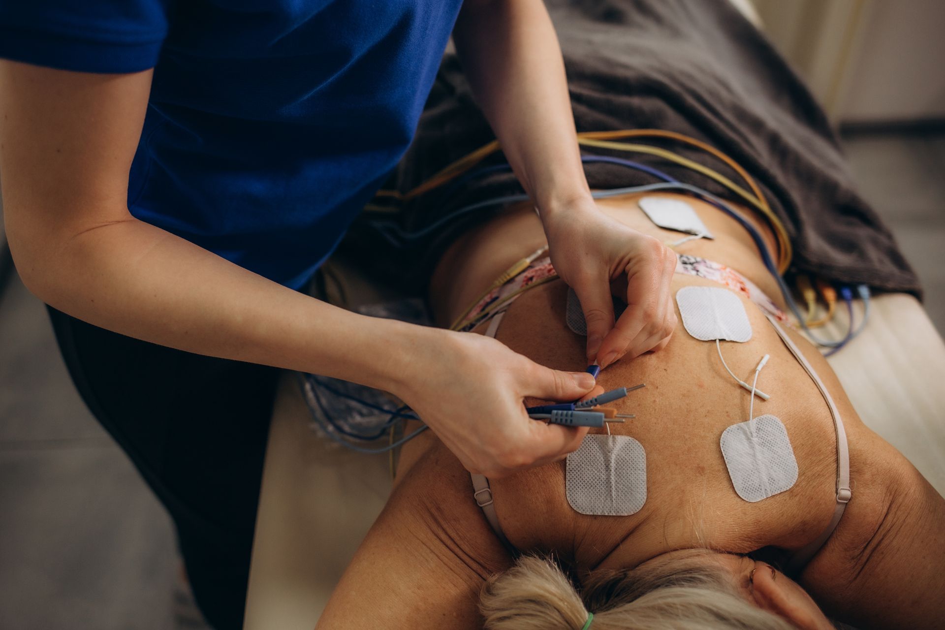 A person 's hand is being examined by a doctor