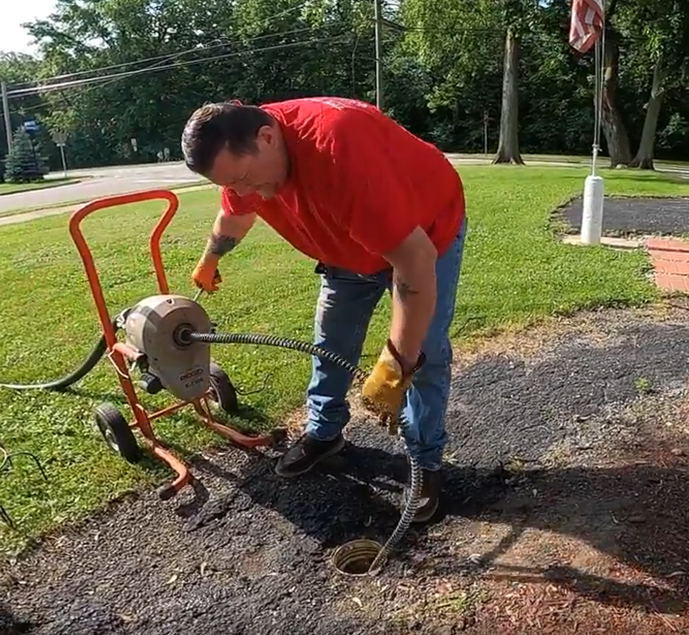 Our Sewer Drain Cleaners Rodding a Sewer Line in Elmhurst