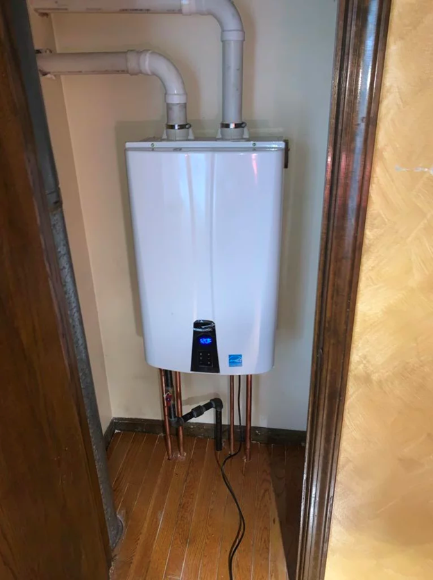 Mt Prospect tankless water heater installed in closet.