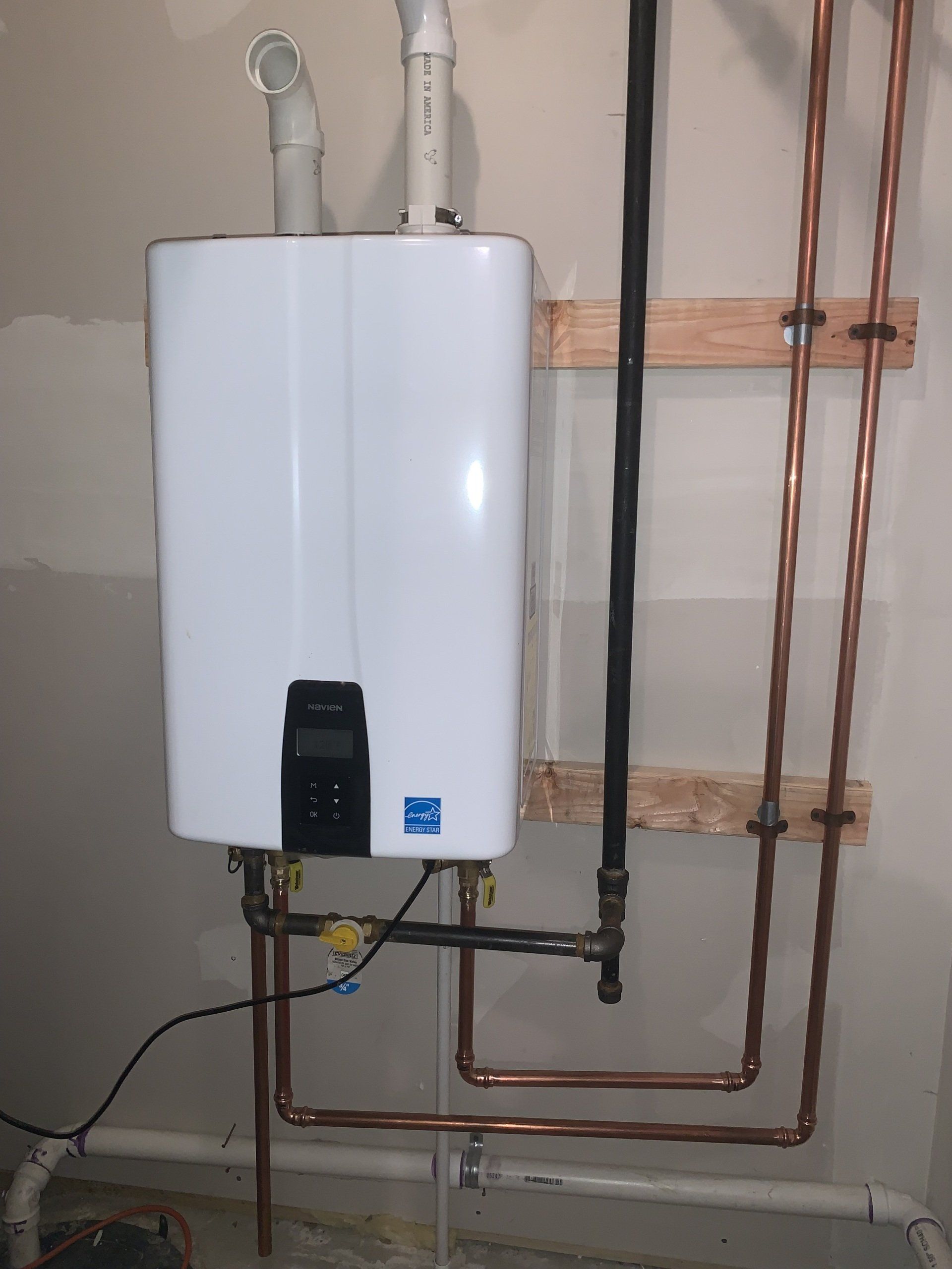 Desplaines Tankless water heater installation in basement.