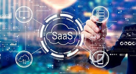 Person drawing SaaS cloud with connected icons, data visualizations.