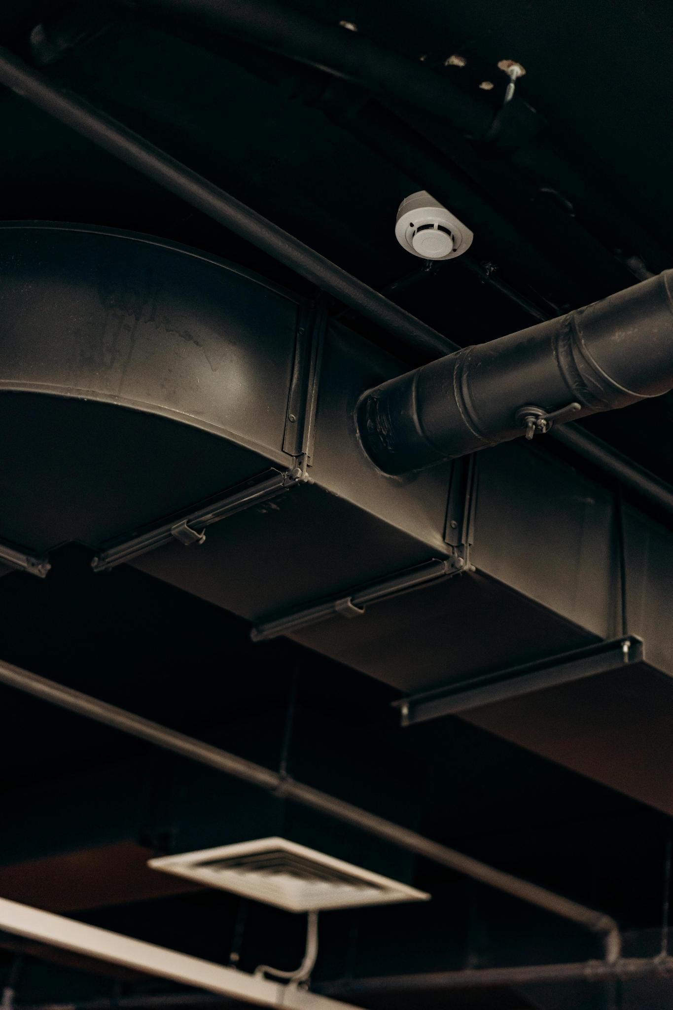 indoor air ducts on a ceiling in a modern interior.
