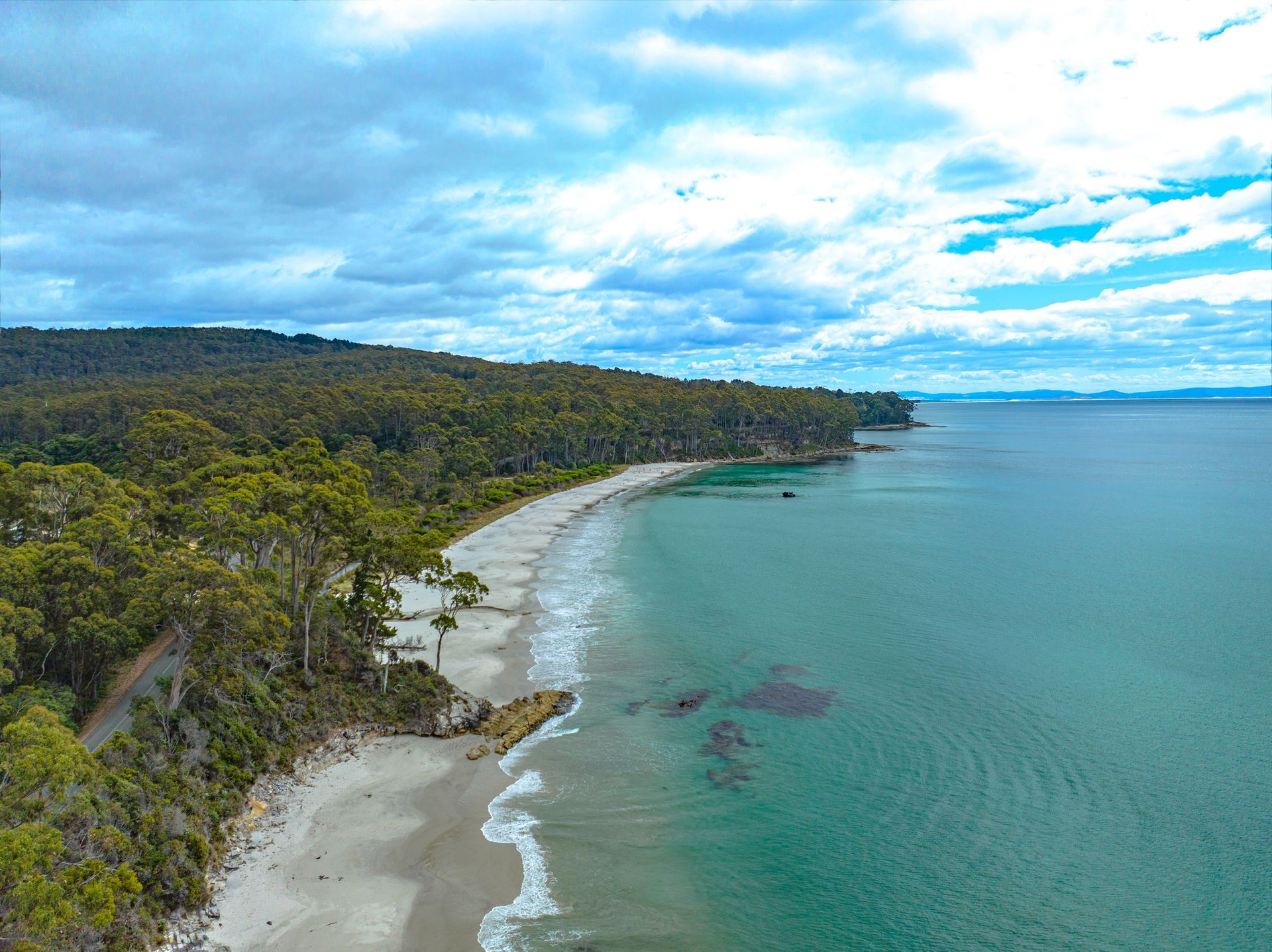 Deserted beach on Bruny Island, Tasmania from the air.