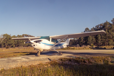Cessna 182 airplane on the Ground with a clear blue sky. Cessna 182 airplane on the Ground with a clear blue sky.