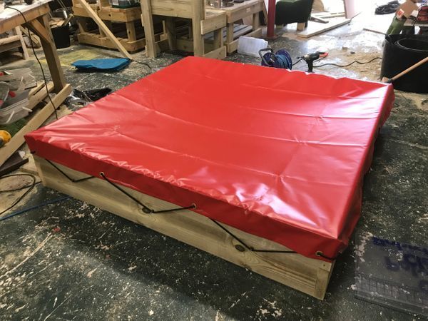 Sandpit with cover