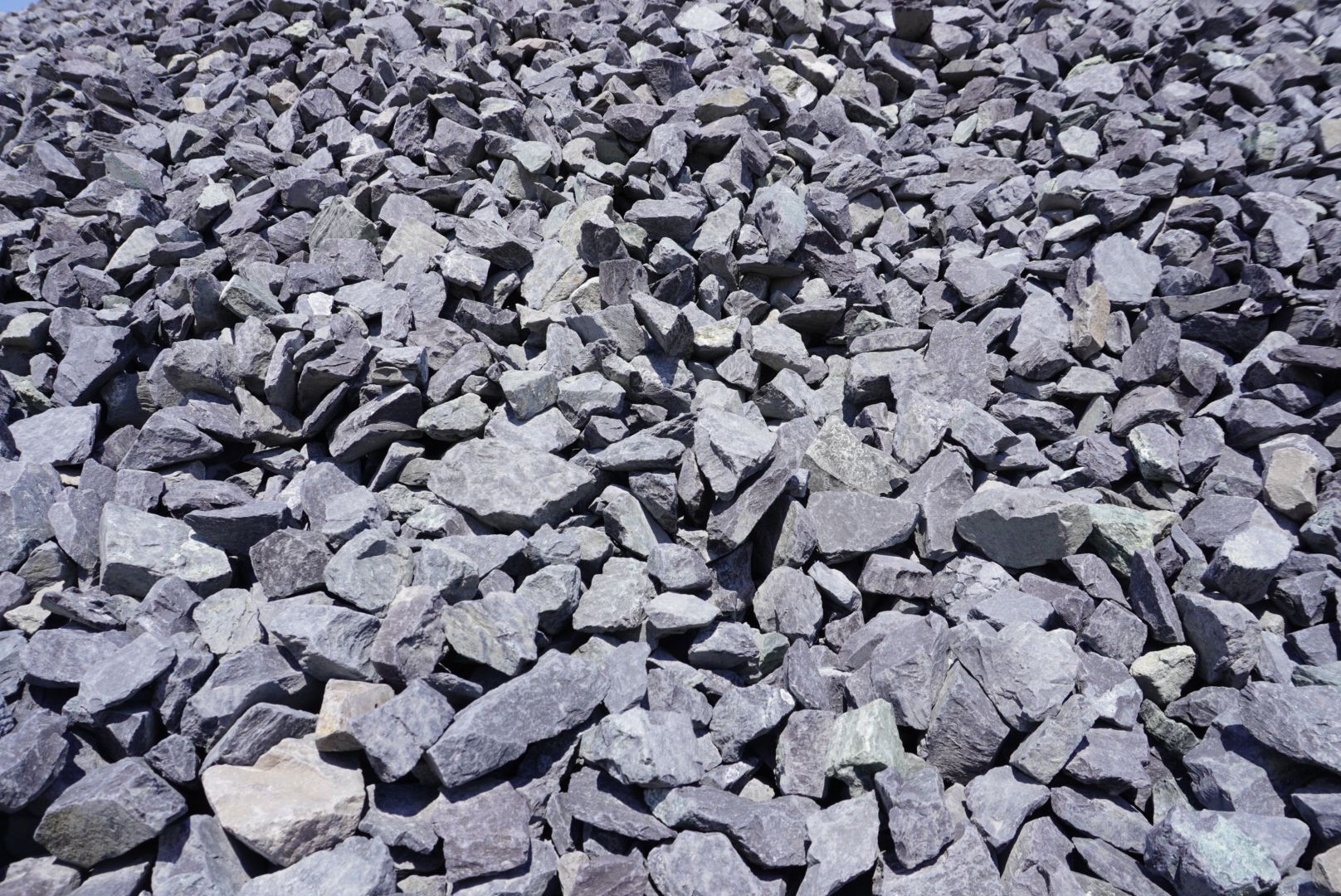 Pile of gray crushed rocks filling the frame