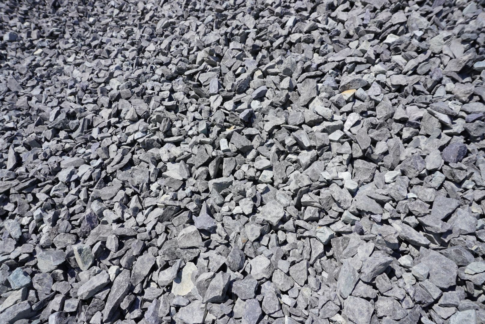 Pile of gray gravel rocks filling the frame