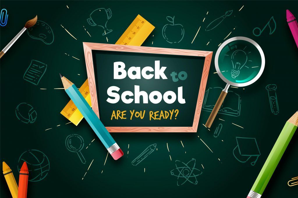 A blackboard with the words `` back to school are you ready '' surrounded by school supplies.