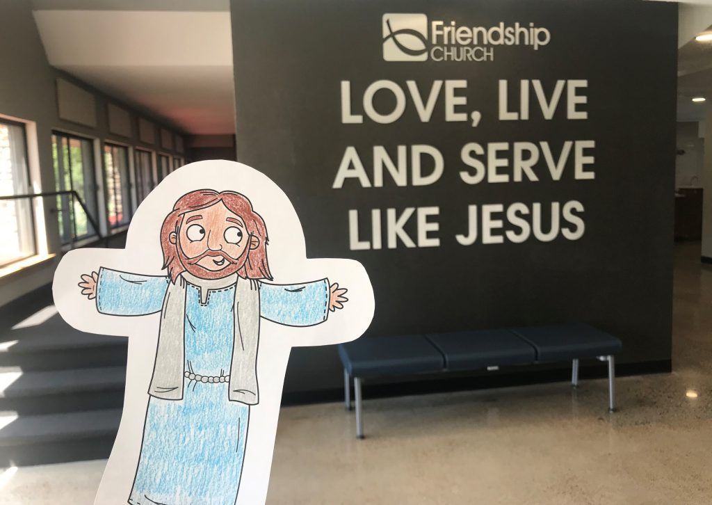 A sign that says love live and serve like jesus