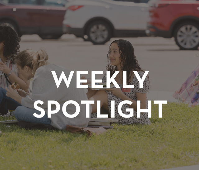 A group of people are sitting in the grass with the words weekly spotlight above them
