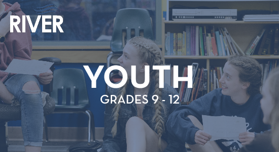 A group of young people are sitting in a library.