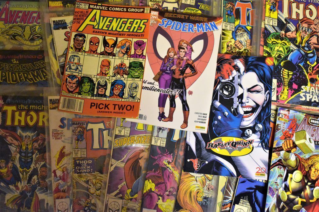 A collage of comic books including the avengers and thor