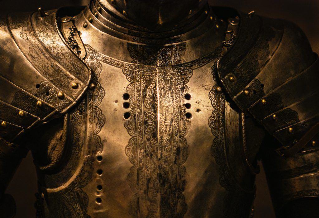 A close up of a knight 's armor on a mannequin.