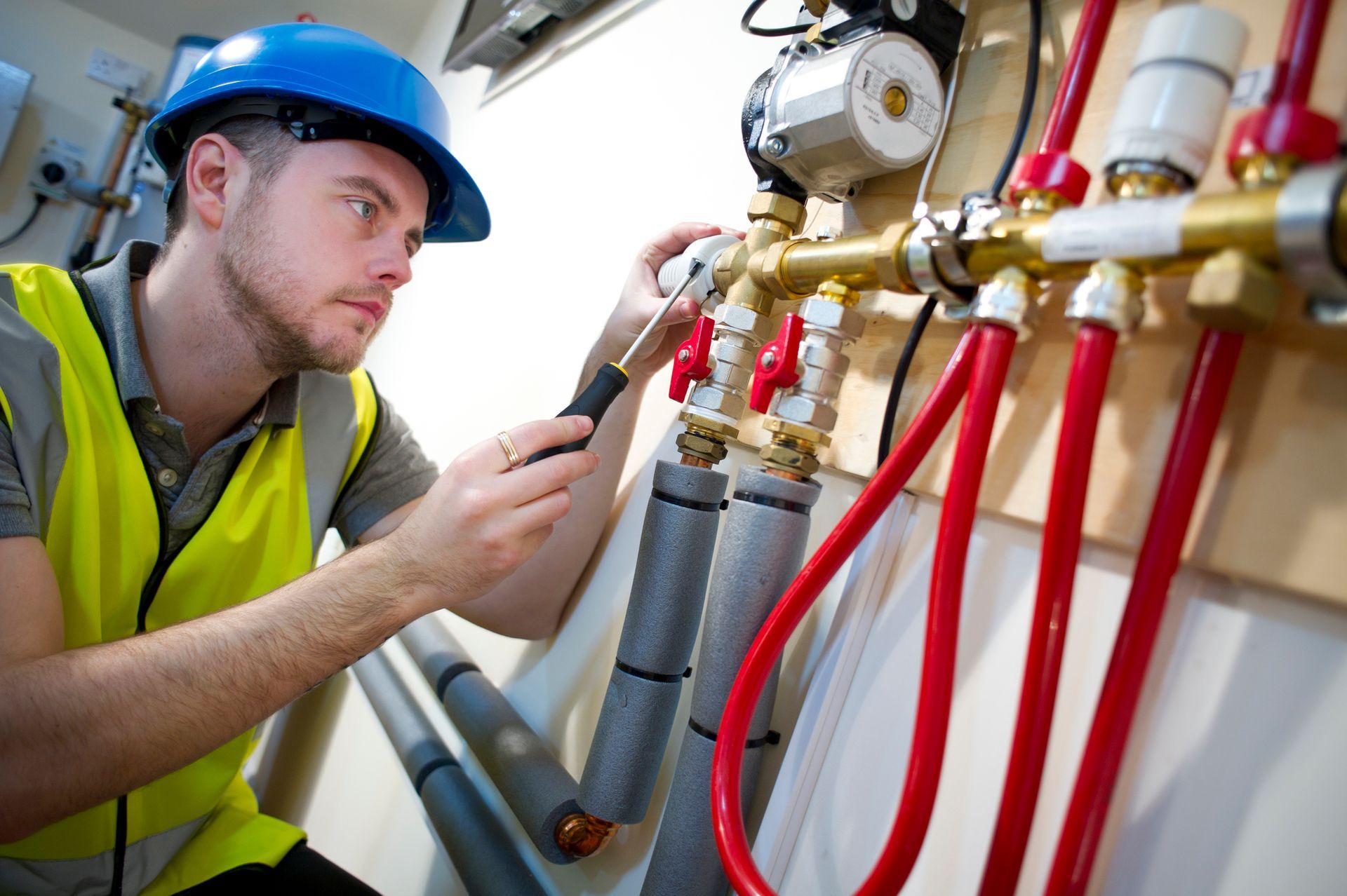 Floor heating system installation showcasing winter plumbing services in action.