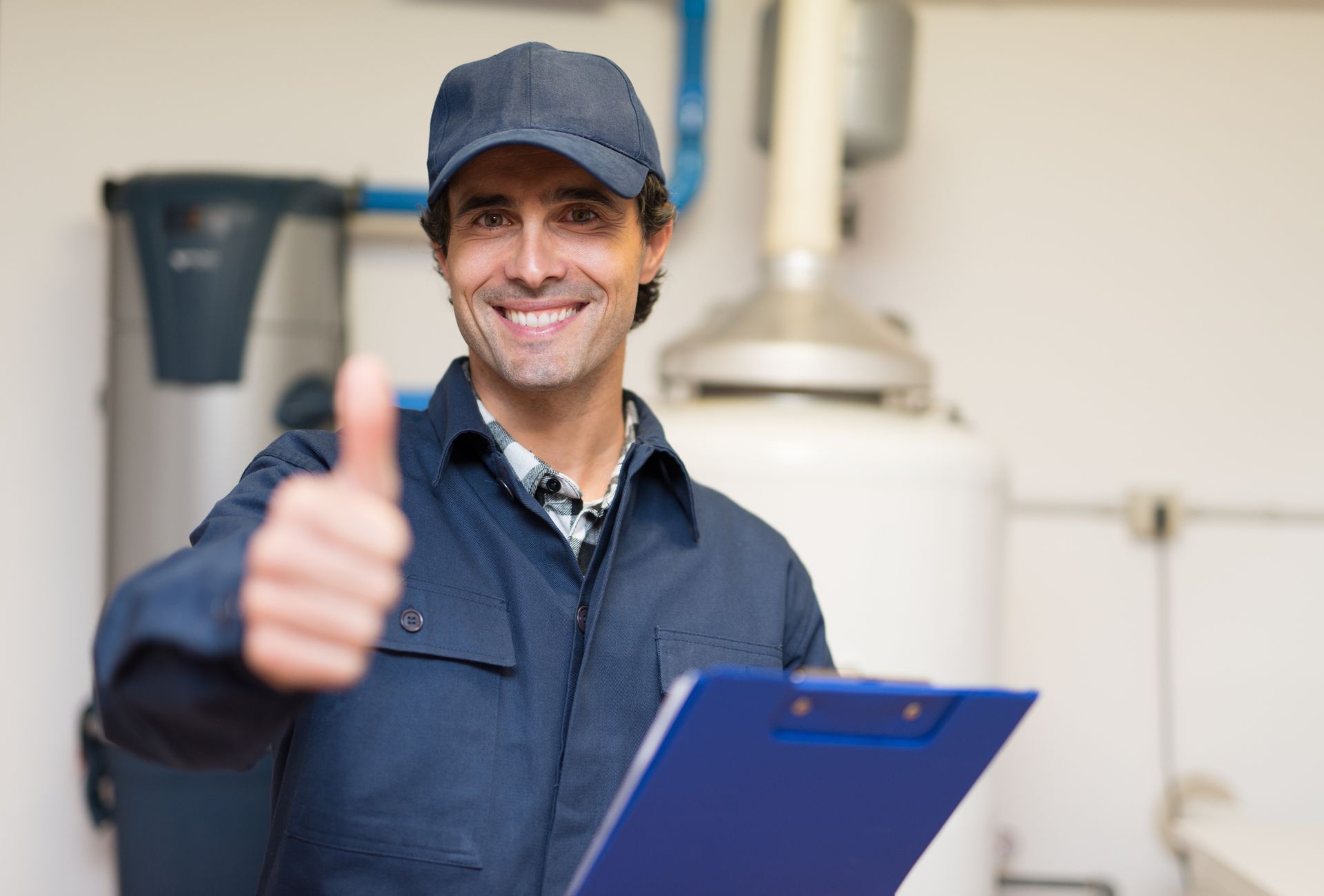 Smiling plumber representing professional winter plumbing services ready to help clients.